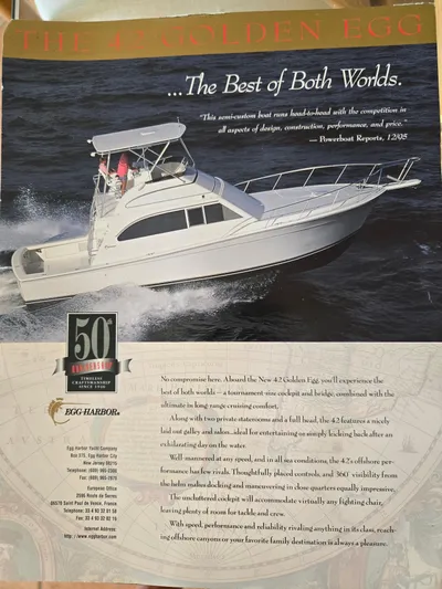 Bad To The Bone Yacht Photos Pics Egg Harbor Golden Egg 42 yacht cruising on water, showcasing luxury and performance.