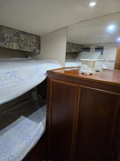 Bad To The Bone Yacht Photos Pics Interior cabin of 1995 Egg Harbor Golden Egg 42 yacht with bunk beds.