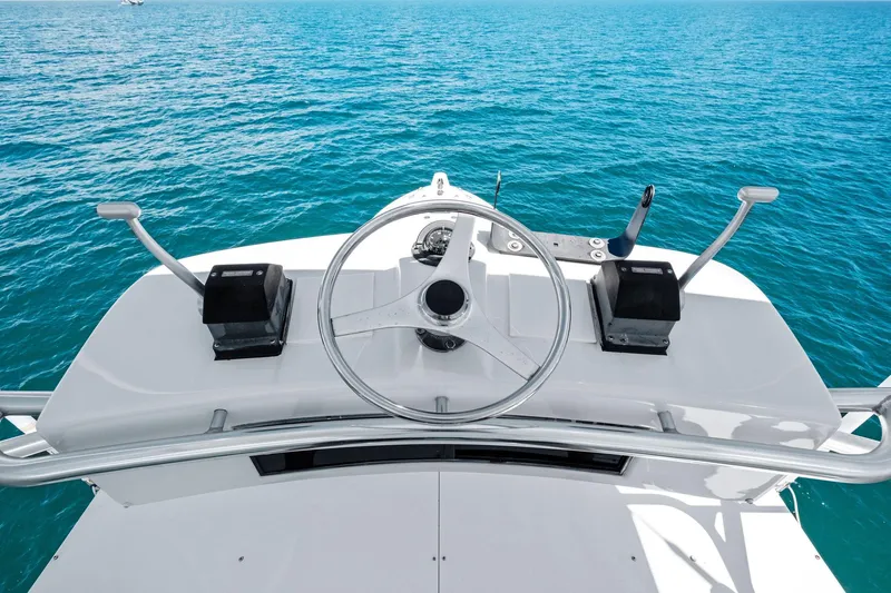 Endurance Yacht Photos Pics Helm of 1998 Hatteras 60 Convertible yacht with ocean view.