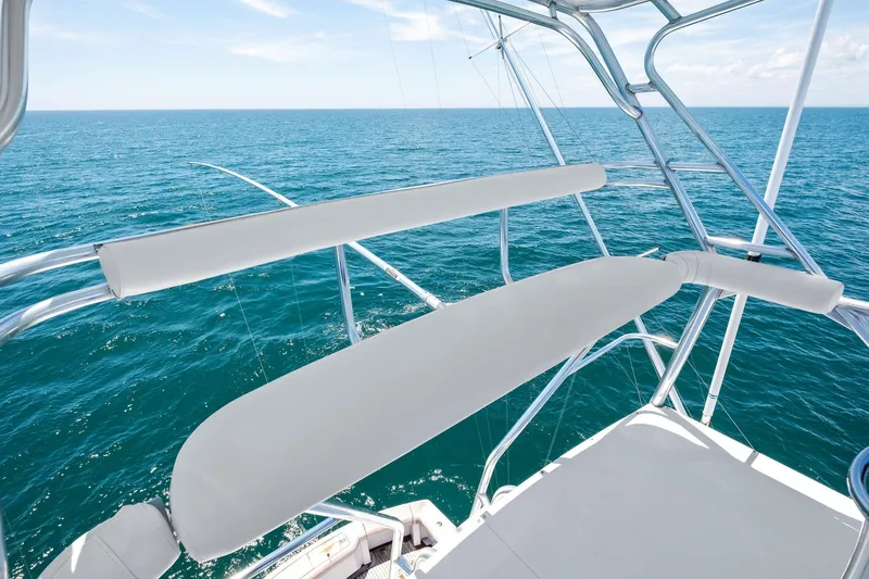 Endurance Yacht Photos Pics 1998 Hatteras 60 Convertible yacht with ocean view from upper deck.