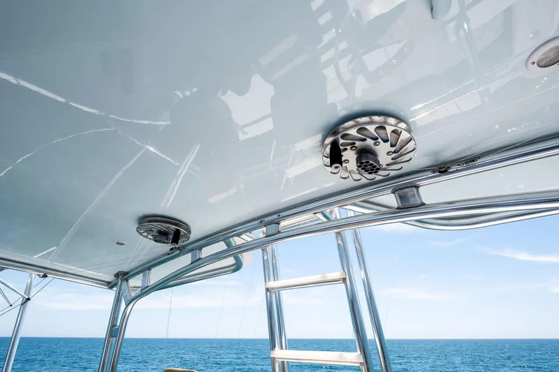 Endurance Yacht Photos Pics 1998 Hatteras 60 Convertible yacht ceiling with speakers and ladder, ocean view.