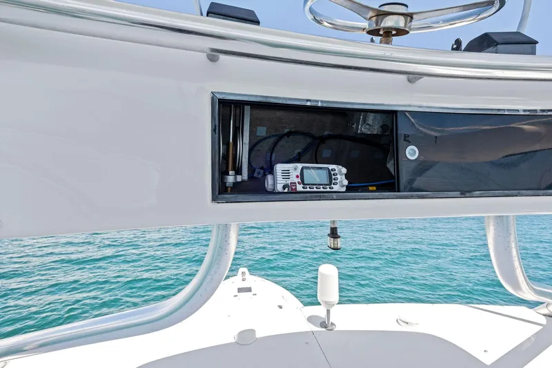 Endurance Yacht Photos Pics 1998 Hatteras 60 Convertible yacht with open electronics compartment, ocean view.