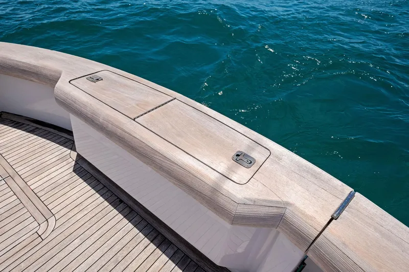 Endurance Yacht Photos Pics Teak deck of 1998 Hatteras 60 Convertible yacht with ocean view.