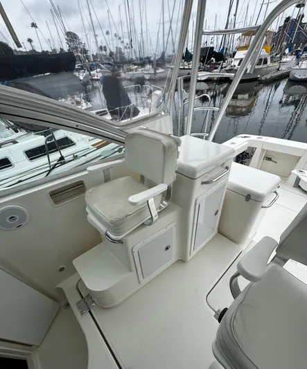 Los Gemelos Yacht Photos Pics 2006 Rampage 33 Express Barta Canyon Edition boat interior with seating and storage at marina.