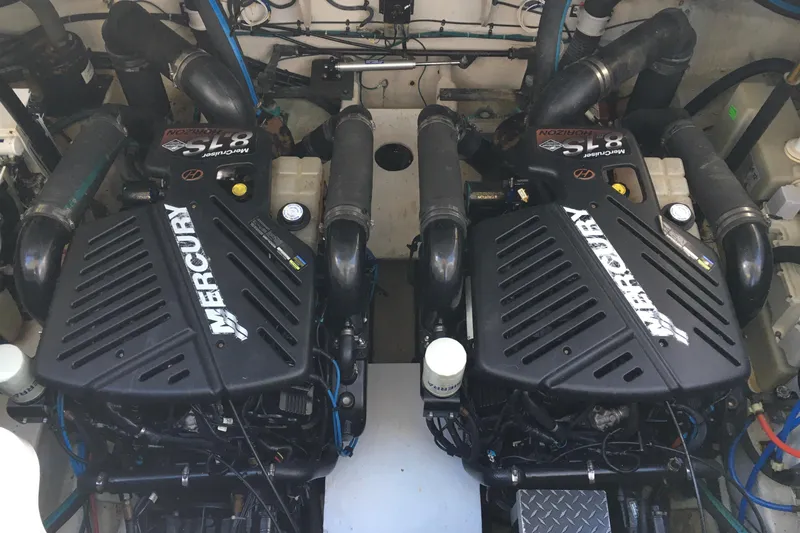 Yacht Photos Pics Twin Mercury engines in a 2007 Sea Ray 340 Sundancer boat engine compartment.