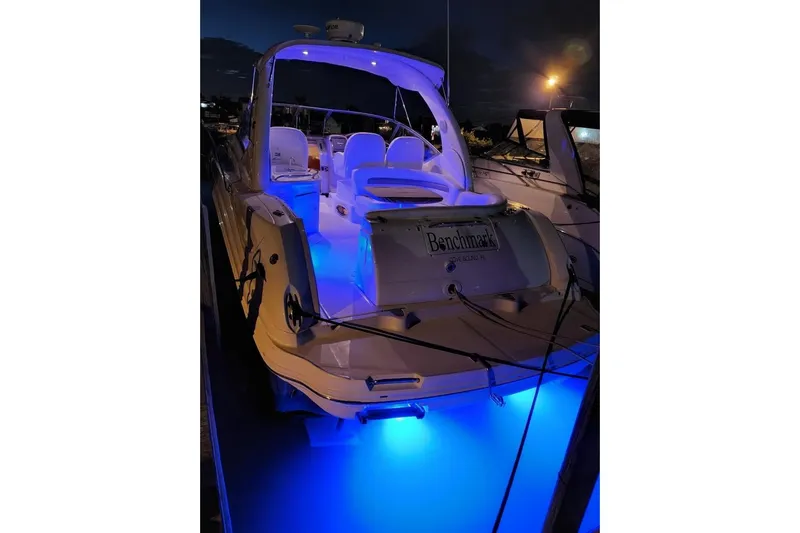  Yacht Photos Pics 2007 Sea Ray 340 Sundancer yacht with blue underwater lights at night.