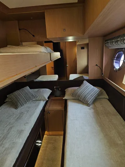  Yacht Photos Pics Interior of 2016 Riva 88' Domino Super yacht with cozy twin beds and modern design.