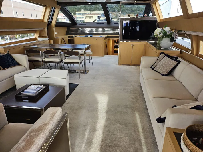  Yacht Photos Pics Luxurious interior of a 2016 Riva 88' Domino Super yacht with elegant seating and dining area.