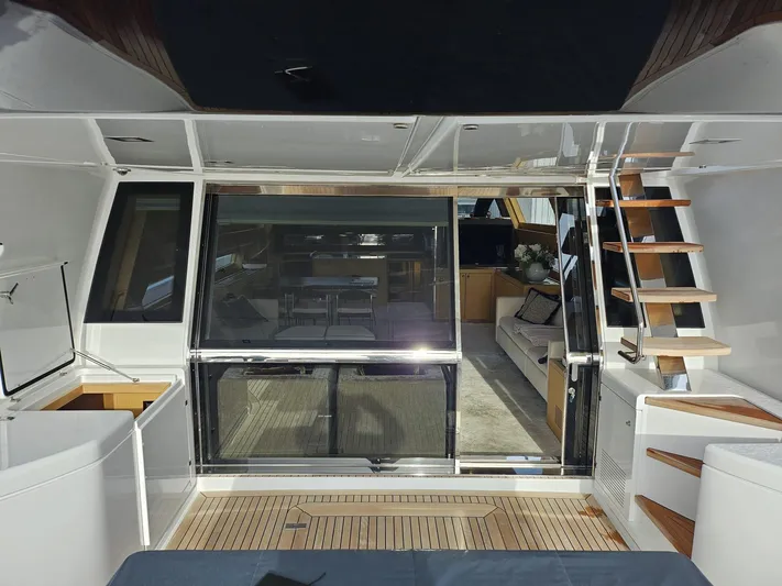  Yacht Photos Pics Luxurious interior of 2016 Riva 88' Domino Super yacht with modern design and wooden accents.