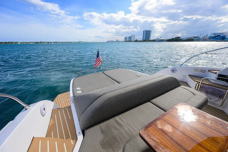 Chloe Yacht Photos Pics Azimut 45 Atlantis 2020 yacht with sun deck, ocean view, and city skyline.