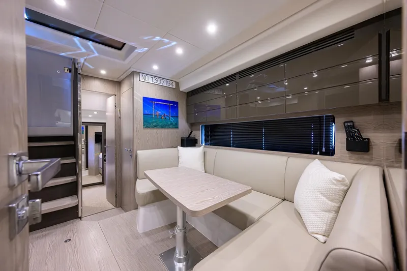 Chloe Yacht Photos Pics Luxurious interior of 2020 Azimut 45 Atlantis yacht with modern seating and decor.
