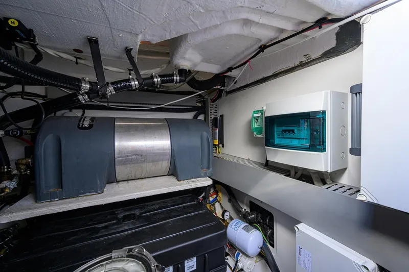 Chloe Yacht Photos Pics Engine room of 2020 Azimut 45 Atlantis yacht, featuring electrical panel and equipment.