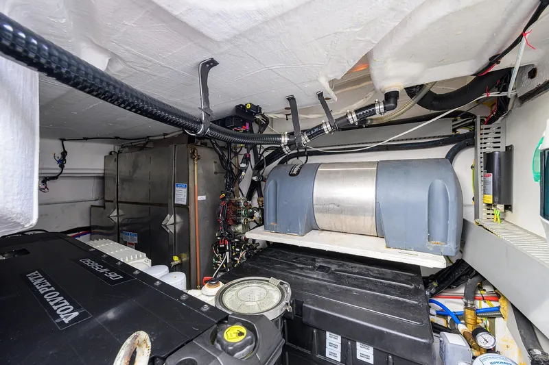 Chloe Yacht Photos Pics Engine room of 2020 Azimut 45 Atlantis yacht, showcasing mechanical components and wiring.