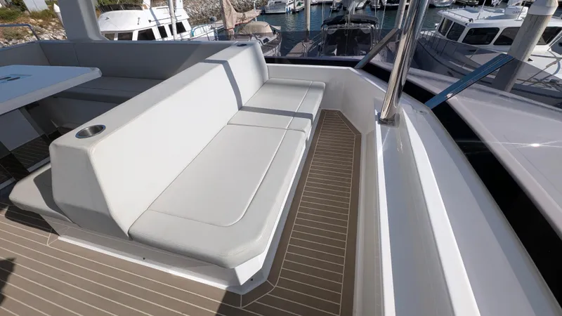 Hamlet Yacht Photos Pics 2023 Leopard Powercat boat seating area with sleek design and modern upholstery.