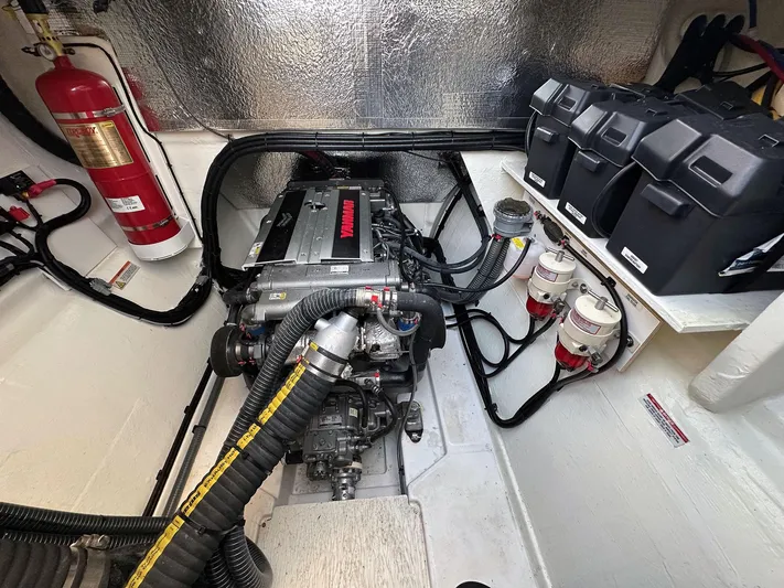 Hamlet Yacht Photos Pics Engine room of 2023 Leopard Powercat with fire extinguisher and battery setup.