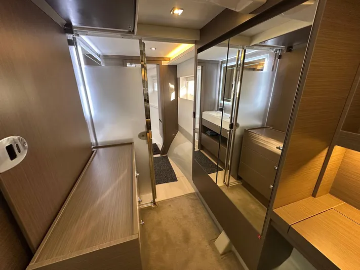 Hamlet Yacht Photos Pics Luxurious interior of 2023 Leopard Powercat yacht with modern design and elegant wood finishes.