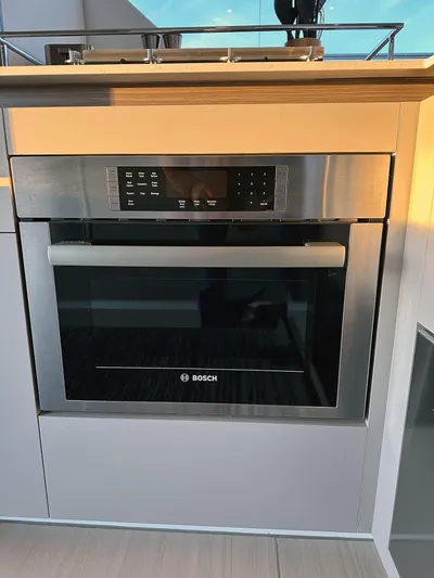 Hamlet Yacht Photos Pics Modern Bosch oven in a 2023 Leopard Powercat kitchen setting.