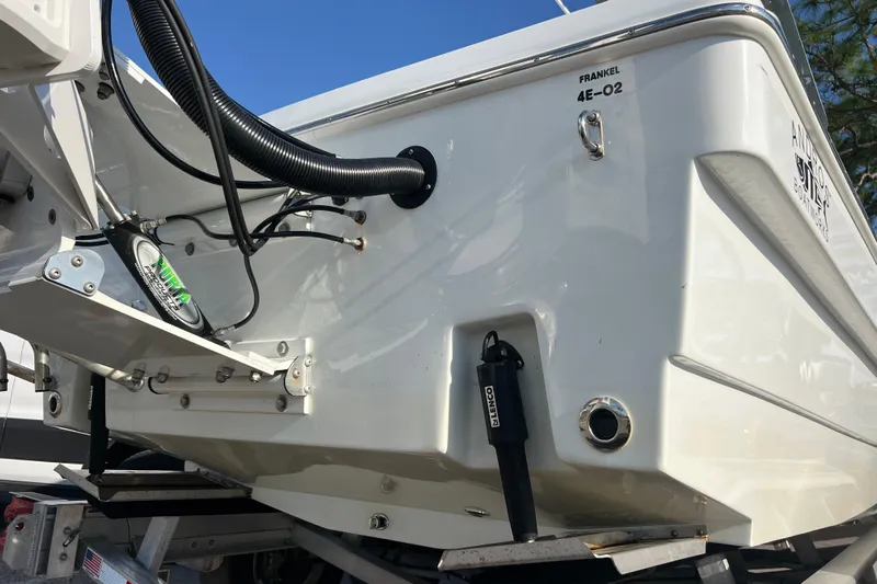  Yacht Photos Pics 2024 Andros Tarpon 26 boat stern with hydraulic components and sleek design.