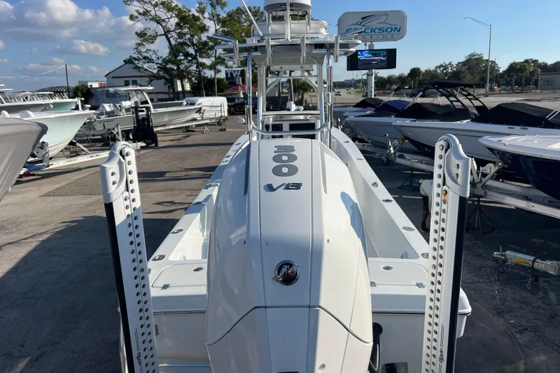  Yacht Photos Pics 2024 Andros Tarpon 26 boat displayed at a marina, featuring a powerful engine.