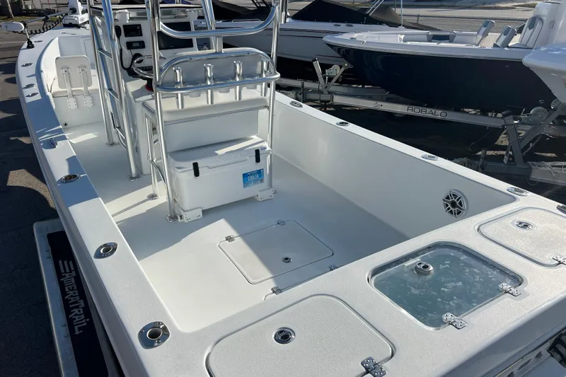  Yacht Photos Pics 2024 Andros Tarpon 26 boat interior with seating and storage compartments.