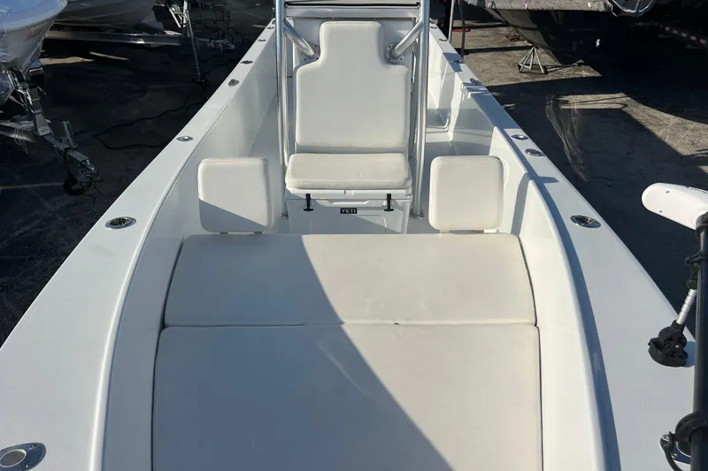  Yacht Photos Pics 2024 Andros Tarpon 26 boat interior with white seating and console.