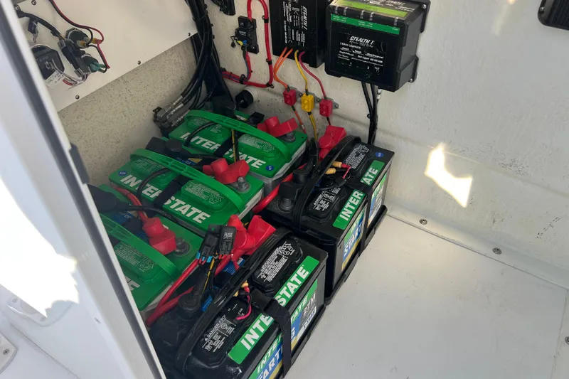  Yacht Photos Pics Battery compartment of 2024 Andros Tarpon 26 with Interstate batteries and wiring setup.