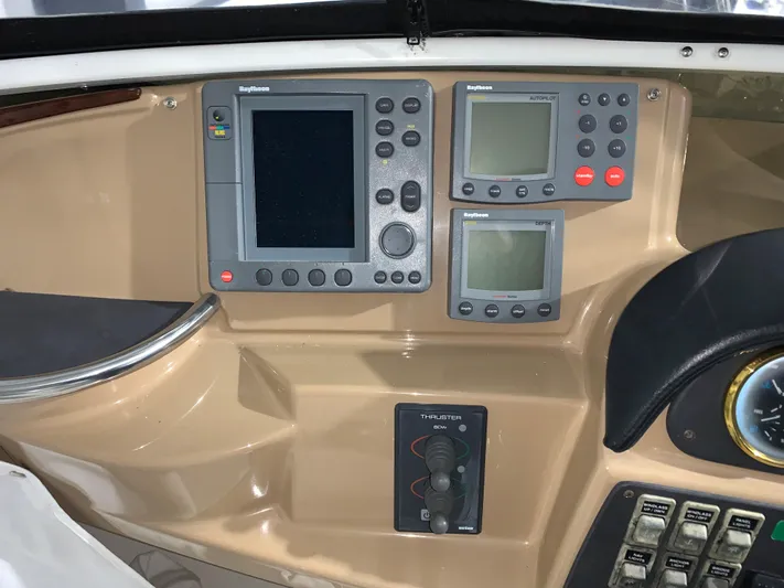 Why Knot Yacht Photos Pics Control panel of a 2001 Carver 396 Motor Yacht with navigation instruments.