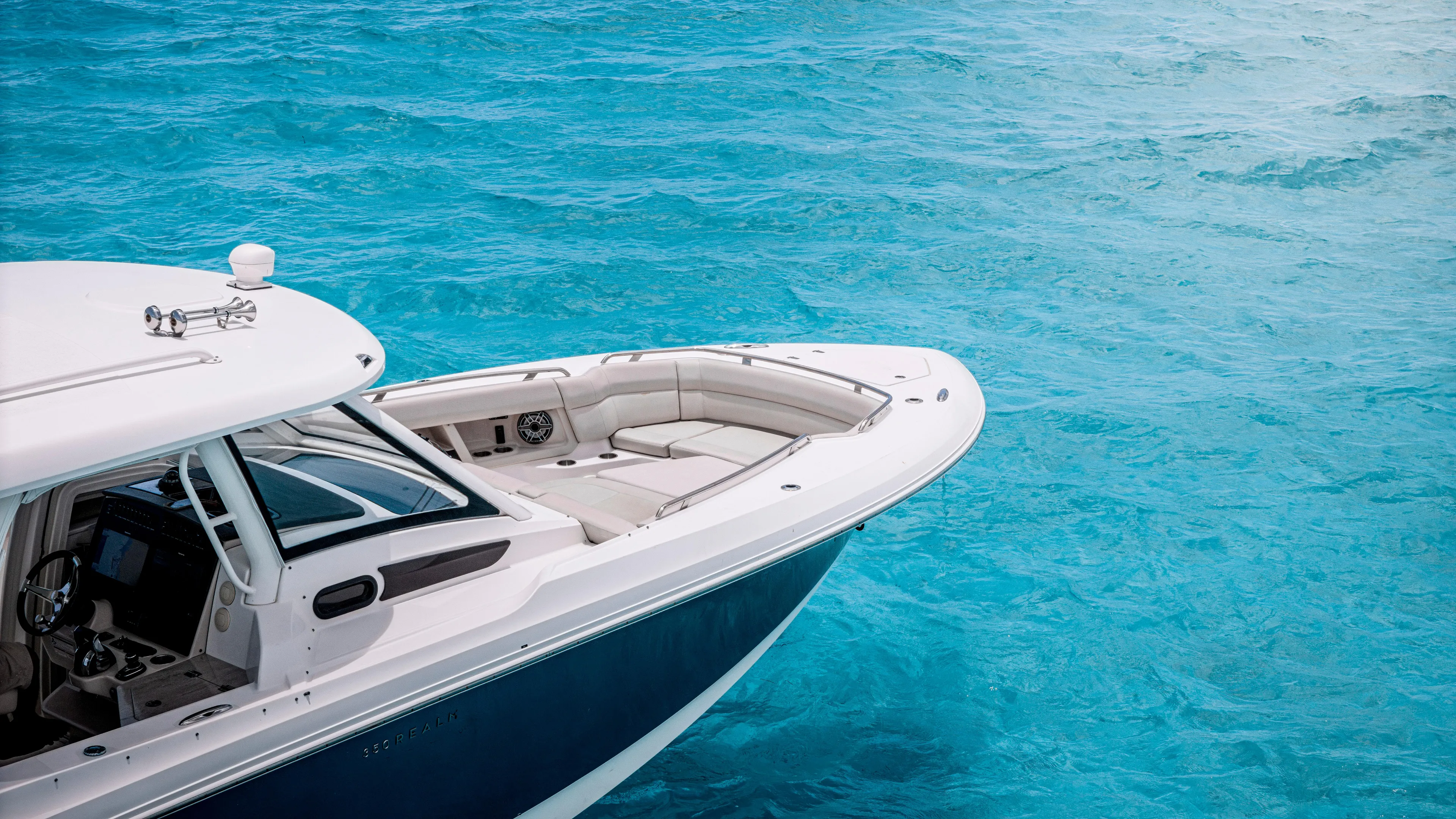 2019 Boston Whaler 350 Realm @ Cancun Yacht Photos Pics Boston Whaler 350 Realm 2019 boat on clear blue water, showcasing luxury and design.