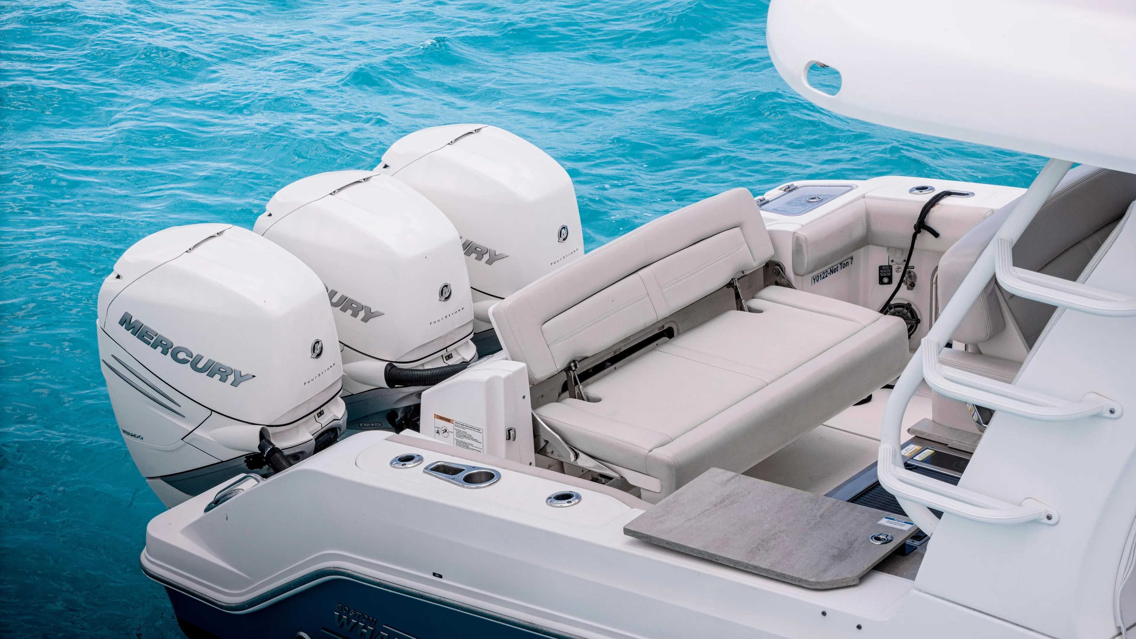 2019 Boston Whaler 350 Realm @ Cancun Yacht Photos Pics 2019 Boston Whaler 350 Realm with triple Mercury engines on turquoise water.