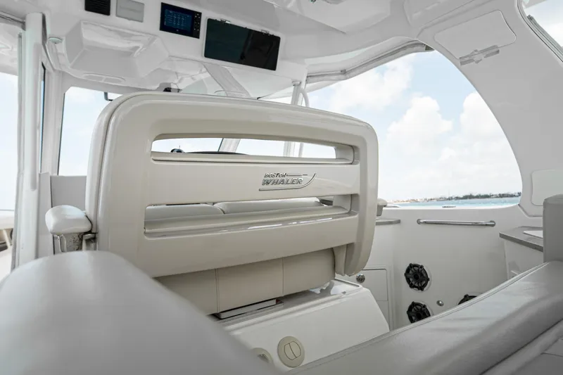 2019 Boston Whaler 350 Realm @ Cancun Yacht Photos Pics 2019 Boston Whaler 350 Realm interior, featuring modern helm seating and sleek design.