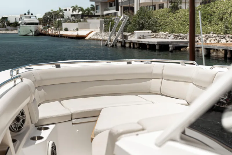 2019 Boston Whaler 350 Realm @ Cancun Yacht Photos Pics 2019 Boston Whaler 350 Realm boat with luxurious seating in a marina setting.