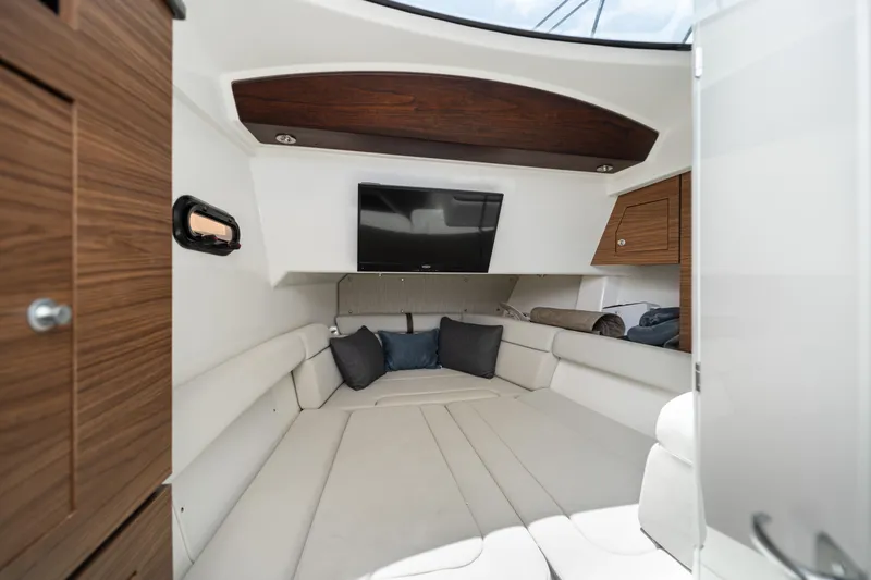2019 Boston Whaler 350 Realm @ Cancun Yacht Photos Pics Interior cabin of 2019 Boston Whaler 350 Realm with seating and TV.