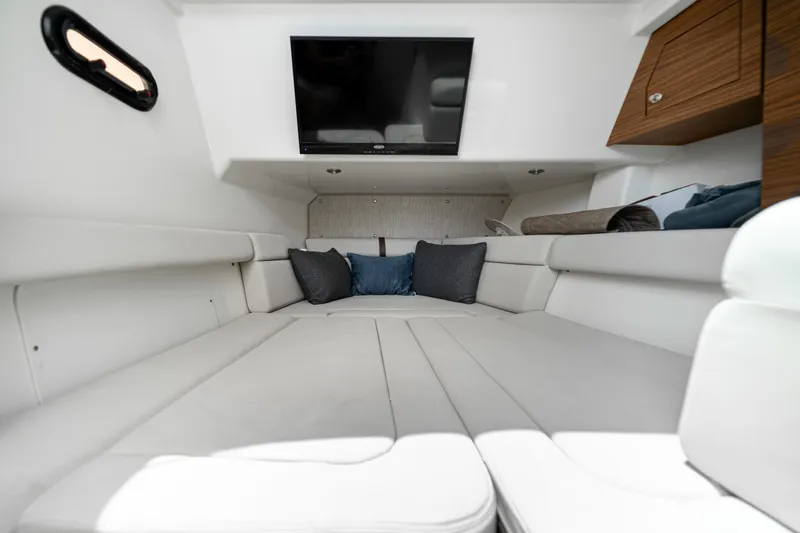 2019 Boston Whaler 350 Realm @ Cancun Yacht Photos Pics 2019 Boston Whaler 350 Realm cabin interior with TV, cushions, and modern design.