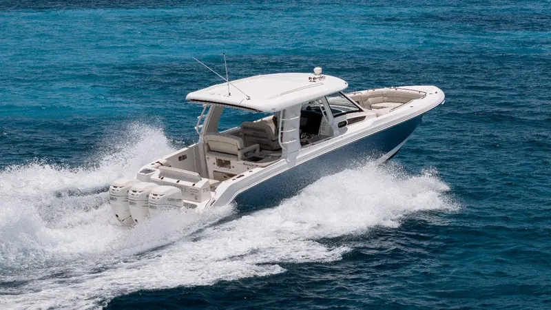 2019 Boston Whaler 350 Realm @ Cancun Yacht Photos Pics 2019 Boston Whaler 350 Realm cruising on open blue water.