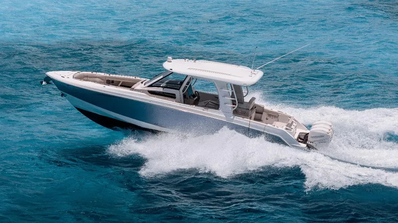 2019 Boston Whaler 350 Realm @ Cancun Yacht Photos Pics 2019 Boston Whaler 350 Realm cruising on clear blue ocean waters.