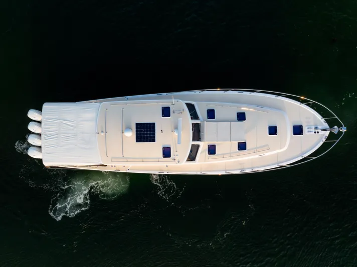 Dayglow Yacht Photos Pics Aerial view of 2020 MJM 53z yacht cruising on dark water.