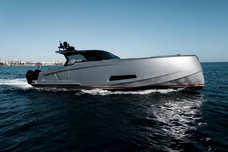 Robin's Nest Yacht Photos Pics 2023 Vanquish Yachts VQ45 Veloce Hardtop cruising on open water.