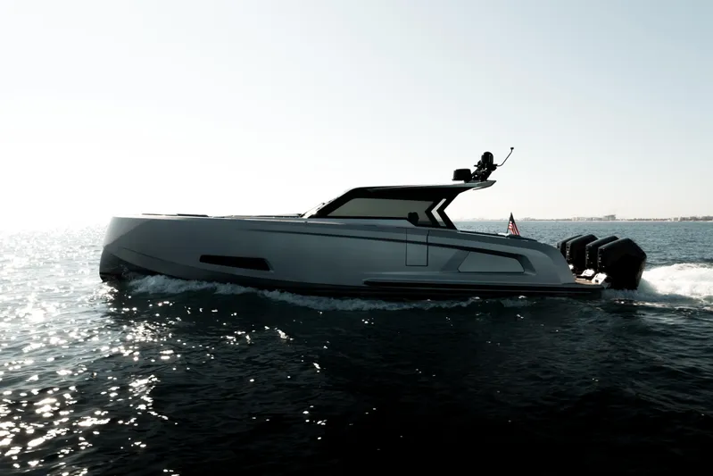 Robin's Nest Yacht Photos Pics 2023 Vanquish Yachts VQ45 Veloce Hardtop cruising on open water.