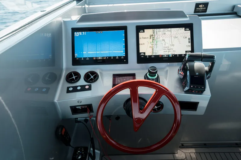 Robin's Nest Yacht Photos Pics Helm of 2023 Vanquish Yachts VQ45 Veloce Hardtop with advanced navigation displays.