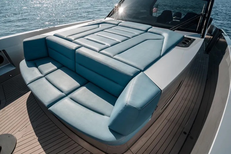 Robin's Nest Yacht Photos Pics 2023 Vanquish Yachts VQ45 Veloce Hardtop with luxurious blue seating on deck.