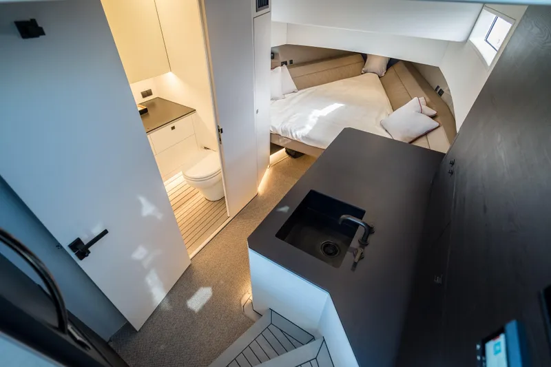 Robin's Nest Yacht Photos Pics Luxurious interior of 2023 Vanquish Yachts VQ45 Veloce Hardtop with modern amenities.