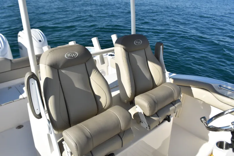  Yacht Photos Pics 2024 Key West 263 FS boat seats with ocean backdrop.