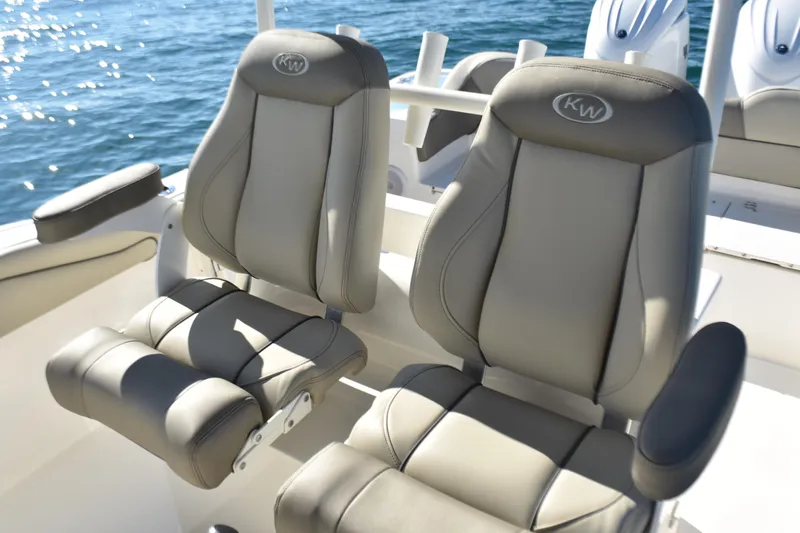  Yacht Photos Pics 2024 Key West 263 FS boat seats with ocean backdrop.