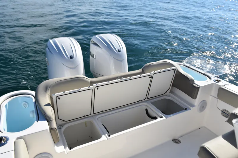  Yacht Photos Pics 2024 Key West 263 FS boat with dual engines and spacious seating on the water.