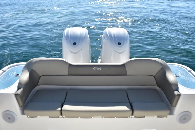  Yacht Photos Pics 2024 Key West 263 FS boat with dual engines and comfortable seating on water.