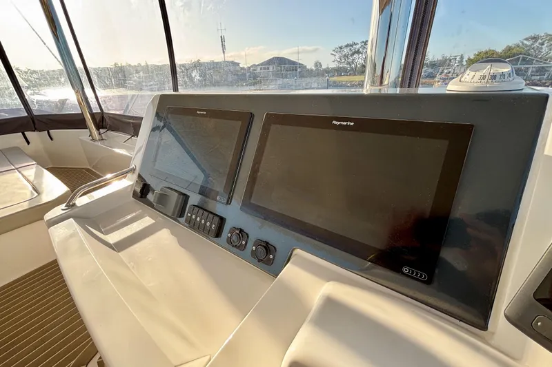  Yacht Photos Pics Control panel of 2022 Leopard 46 Powercat with navigation screens and instruments.
