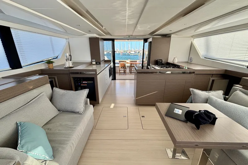  Yacht Photos Pics Luxurious interior of 2022 Leopard 46 Powercat yacht with modern furnishings and sea view.