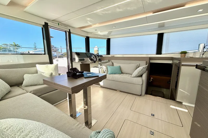  Yacht Photos Pics Modern interior of 2022 Leopard 46 Powercat yacht with plush seating and sleek design.