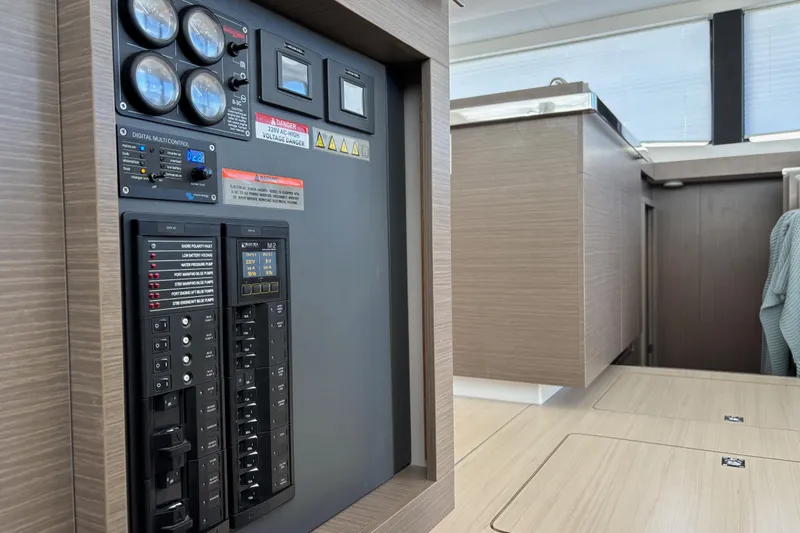  Yacht Photos Pics Electrical control panel on 2022 Leopard 46 Powercat yacht interior.
