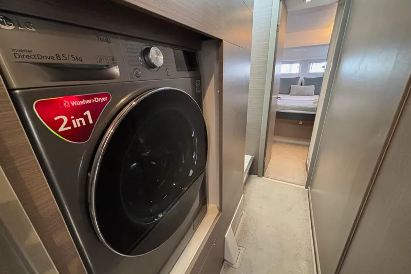  Yacht Photos Pics LG 2-in-1 washer-dryer in 2022 Leopard 46 Powercat yacht interior hallway.